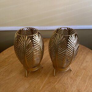 2 Lamps with lighted candles, palm tree leaf design,both lights work.